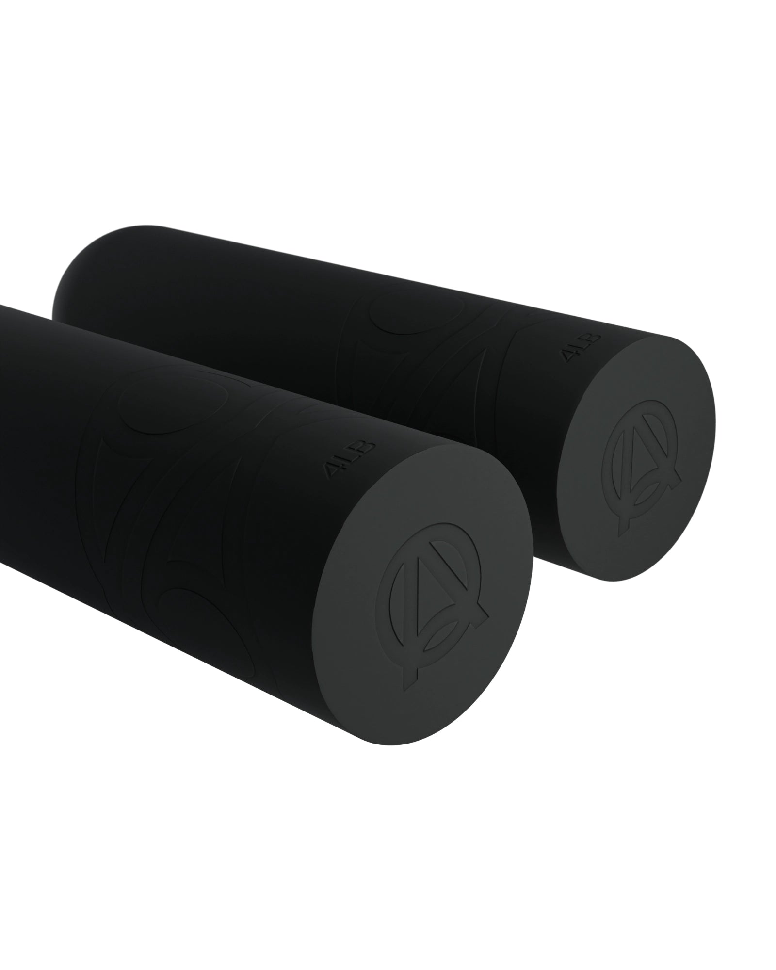 Close-up of soft silicone 4LB black dumbbells with capsule shape design