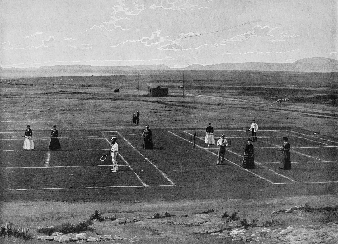 Historic photo of people playing lawn tennis when it was first invented in England in 1870s 