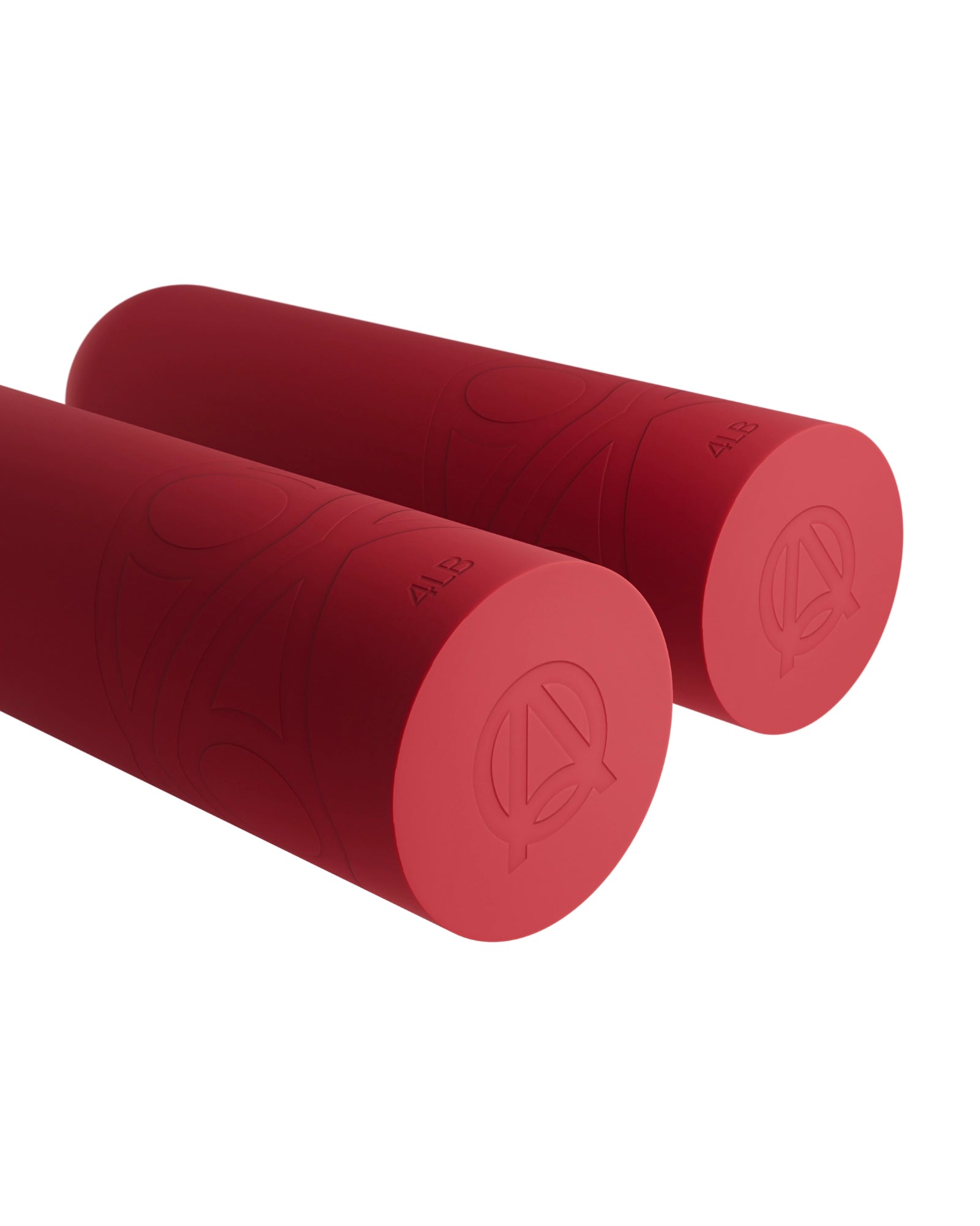 Close-up of soft silicone 4LB red dumbbells with capsule shape design